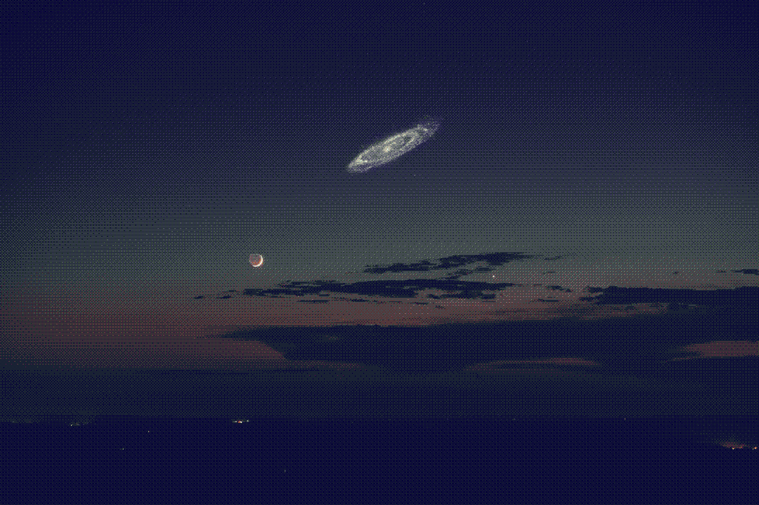 A photoshopped image of the Andromeda galaxy as it would appear if it were brighter.